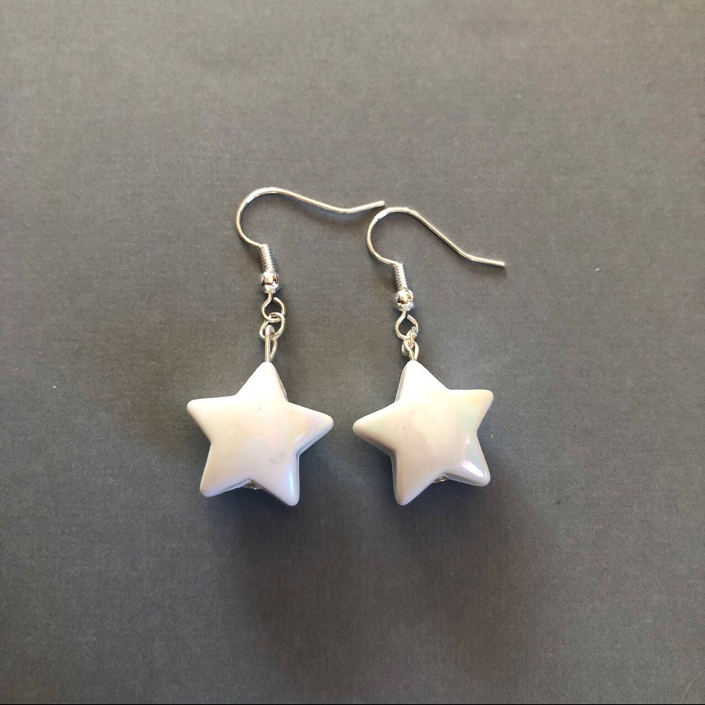 White color shift star earrings